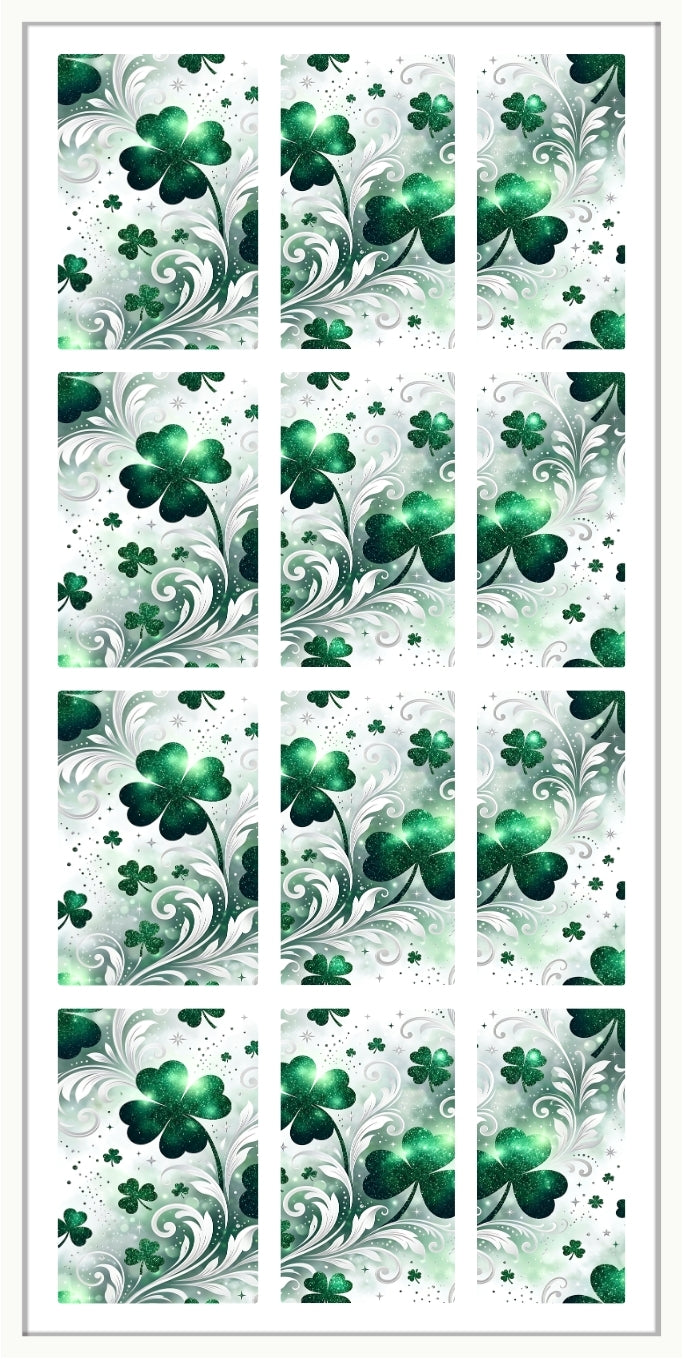 Set of green shamrock designs on a white background
